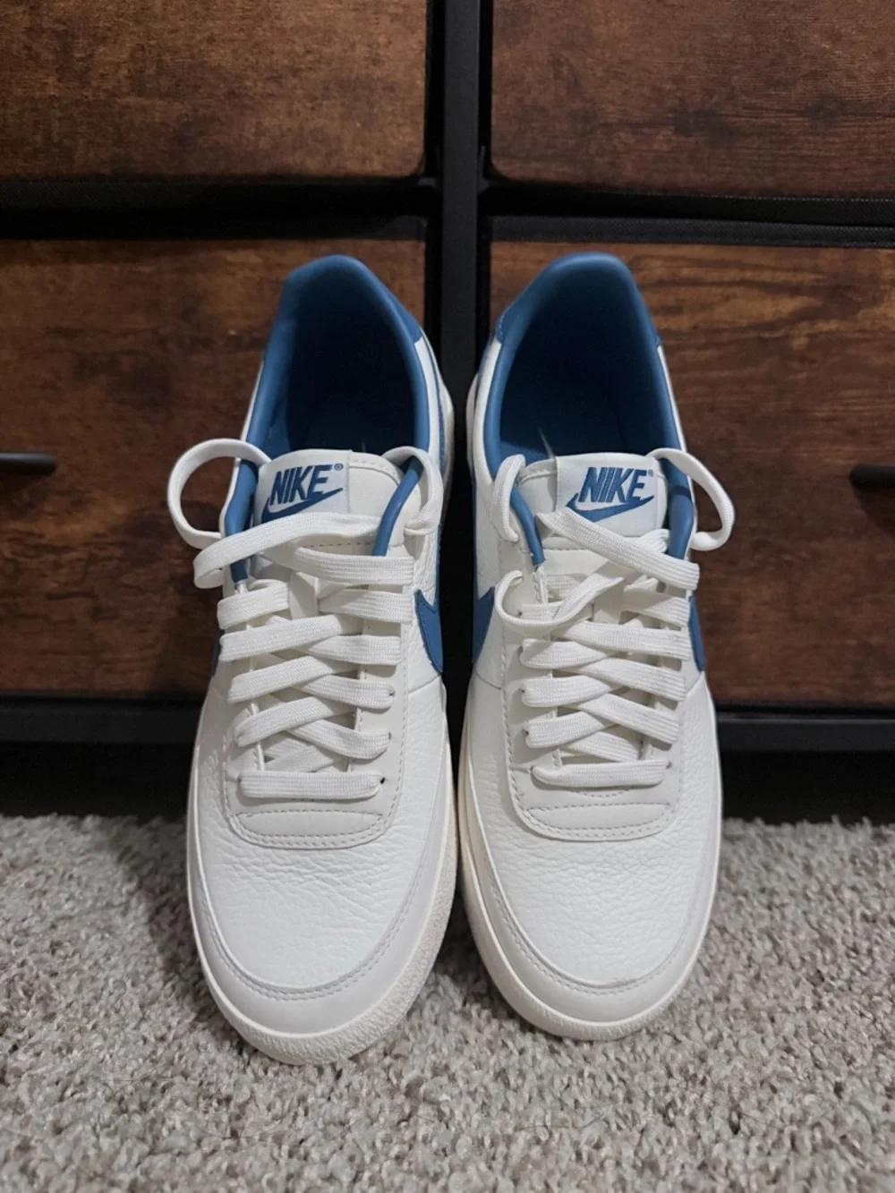 Nike Men’s White Sneakers with Blue Swoosh